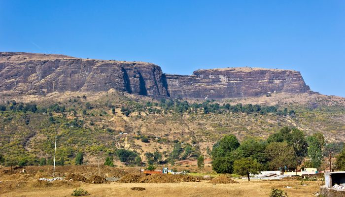 Brahmagiri Fort Trek - A stunning snapshot of the trail ascending towards Brahmagiri Fort, surrounded by lush greenery and scenic beauty