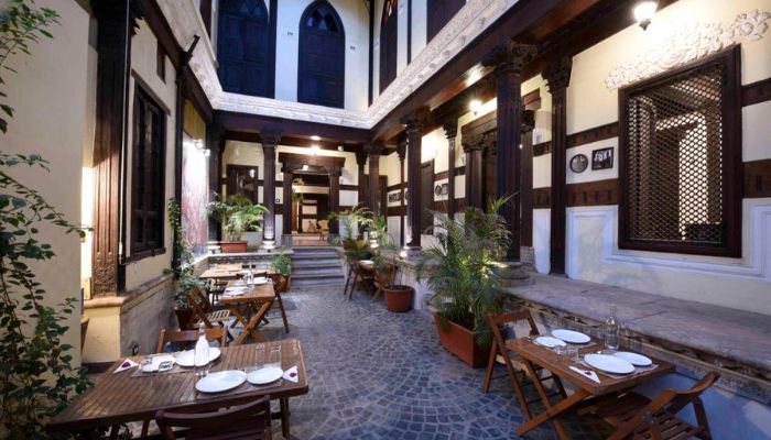 Enchanting courtyard of Deewanji Ni Haveli, a pet-friendly heritage stay offering a glimpse into the rich history of Ahmedabad