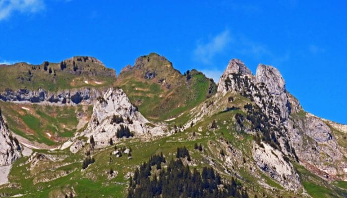 Tranquil beauty along the hiking trails of Steintal, Engelberg, Switzerland, surrounded by lush greenery and stunning alpine vistas