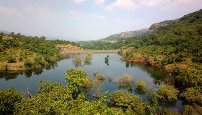 Ratangad Lake - a serene water body nestled amidst the stunning landscapes of the Ratangad Fort trekking trail