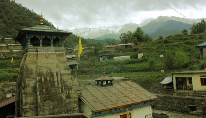 Triyuginarayan Temple, a sacred site atop the mountains, known as the mythical wedding venue of Lord Shiva, enveloped by scenic vistas