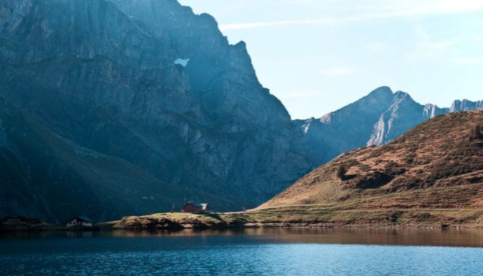 Captivating panoramic views of Trübsee, a stunning alpine lake nestled beneath the majestic Mount Titlis in Switzerland