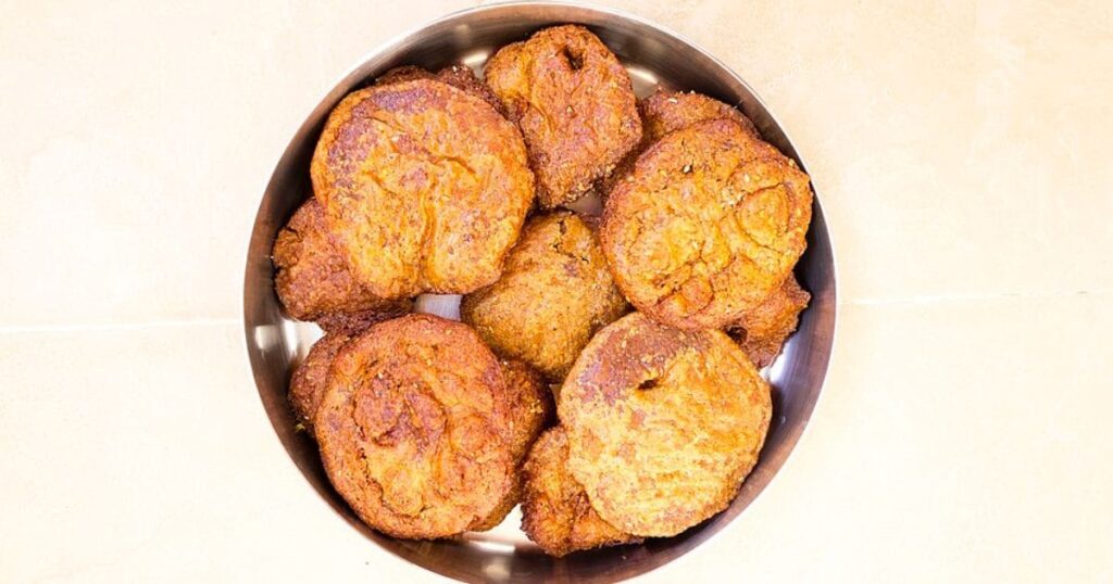 Ariselu, a traditional deep-fried rice flour and jaggery sweet.